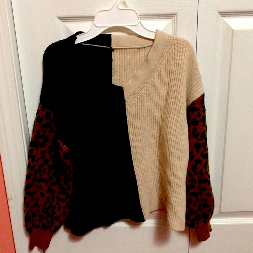 This is a pull over V Neck Sweater.